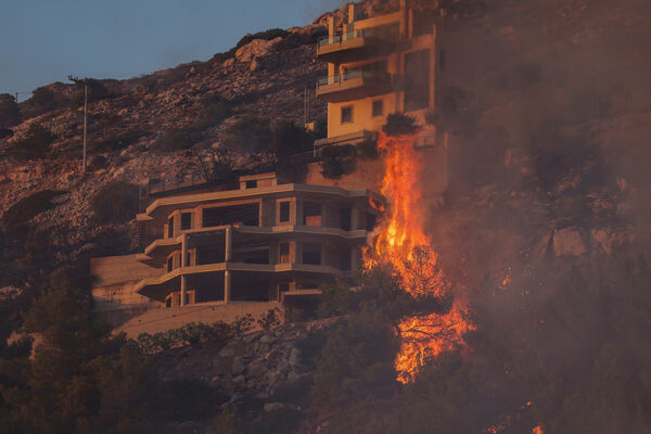 Ugunsgrēks Atēnu apkārtnē, Grieķijā. 2023. gada 18. jūlijs. Foto: AFP/Scanpix