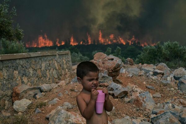 Ugunsgrēks Atēnu apkārtnē, Grieķijā. 2023. gada 18. jūlijs. Foto: AFP/Scanpix
