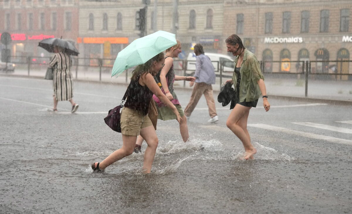 Lietusgāzes Rīgā šī gada augusta sākumā. Foto: Lita Millere/LETA