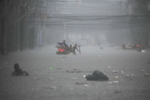 Plūdi Filipīnās. Foto: scanpix/AFP