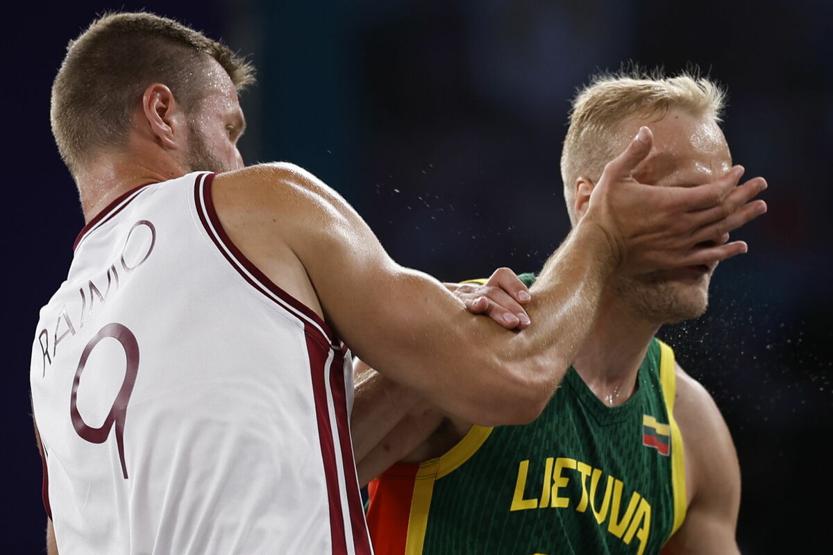 Zigmārs Raimo un Evalds Džaugis. Foto: EPA/YOAN VALAT/Scanpix