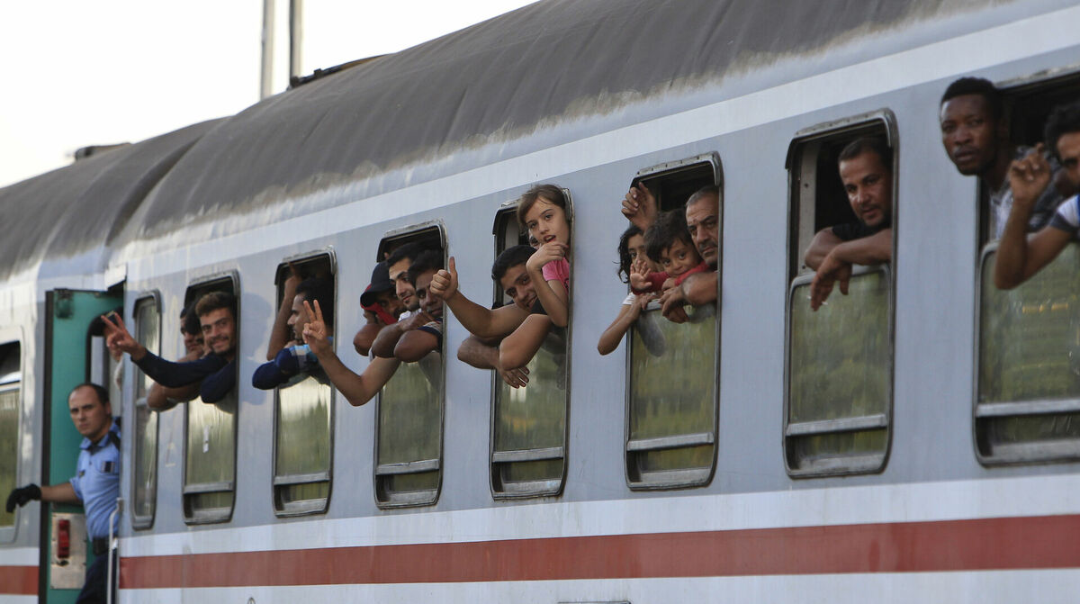 Imigranti Ungārijā. Foto: REUTERS/Bernadett Szabo