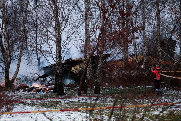 Aviokatastrofa Viļņā. Foto: scanpix/ Petras MALUKAS / AFP