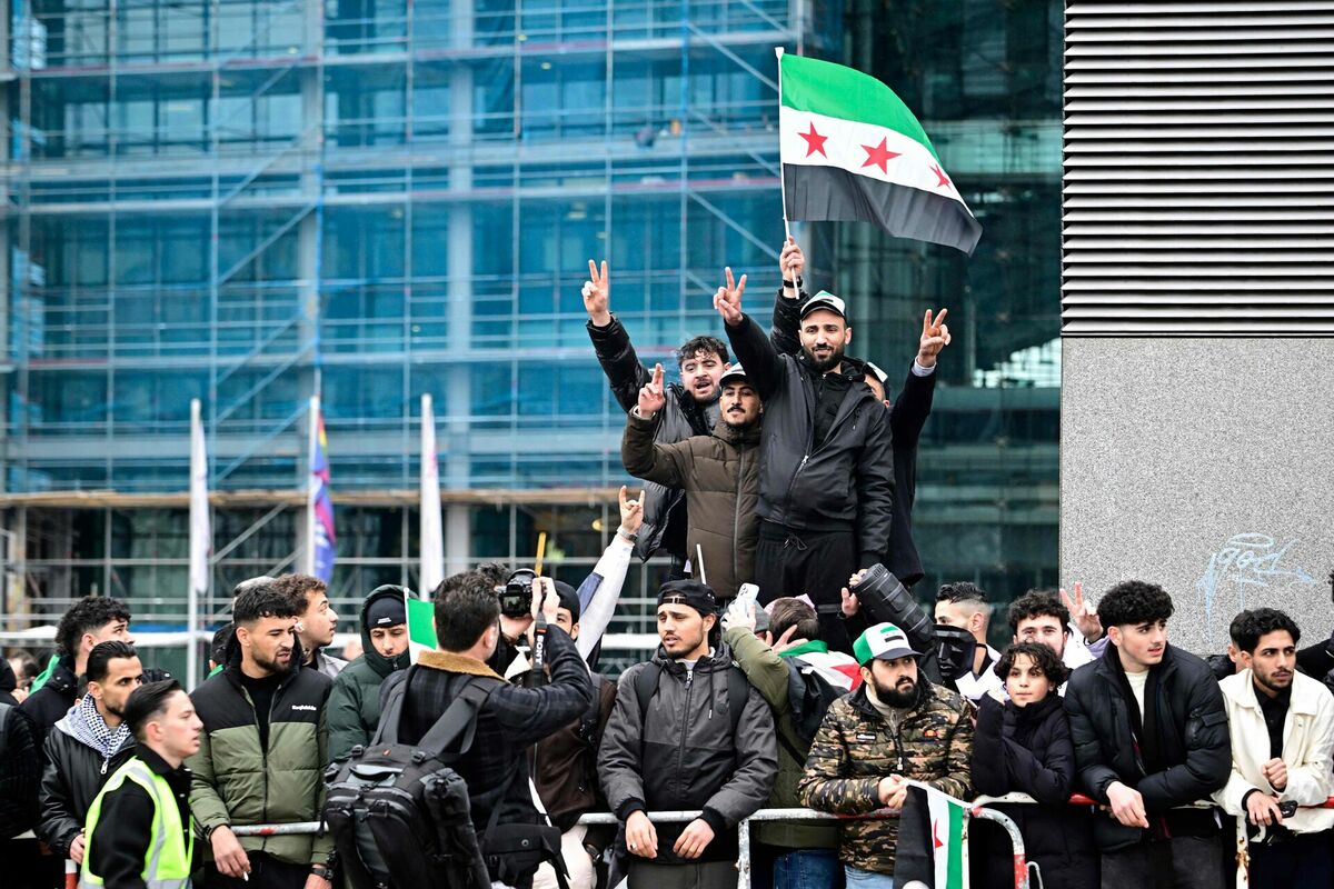 Sīriešu protestētāji Vācijā. Foto: Tobias SCHWARZ / AFP